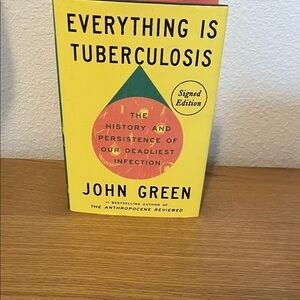 Signed Book Page with Teal Signature